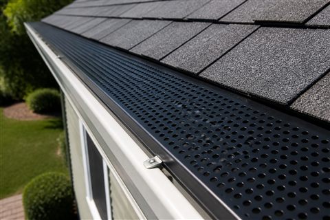 Clean gutter with guard installed after service